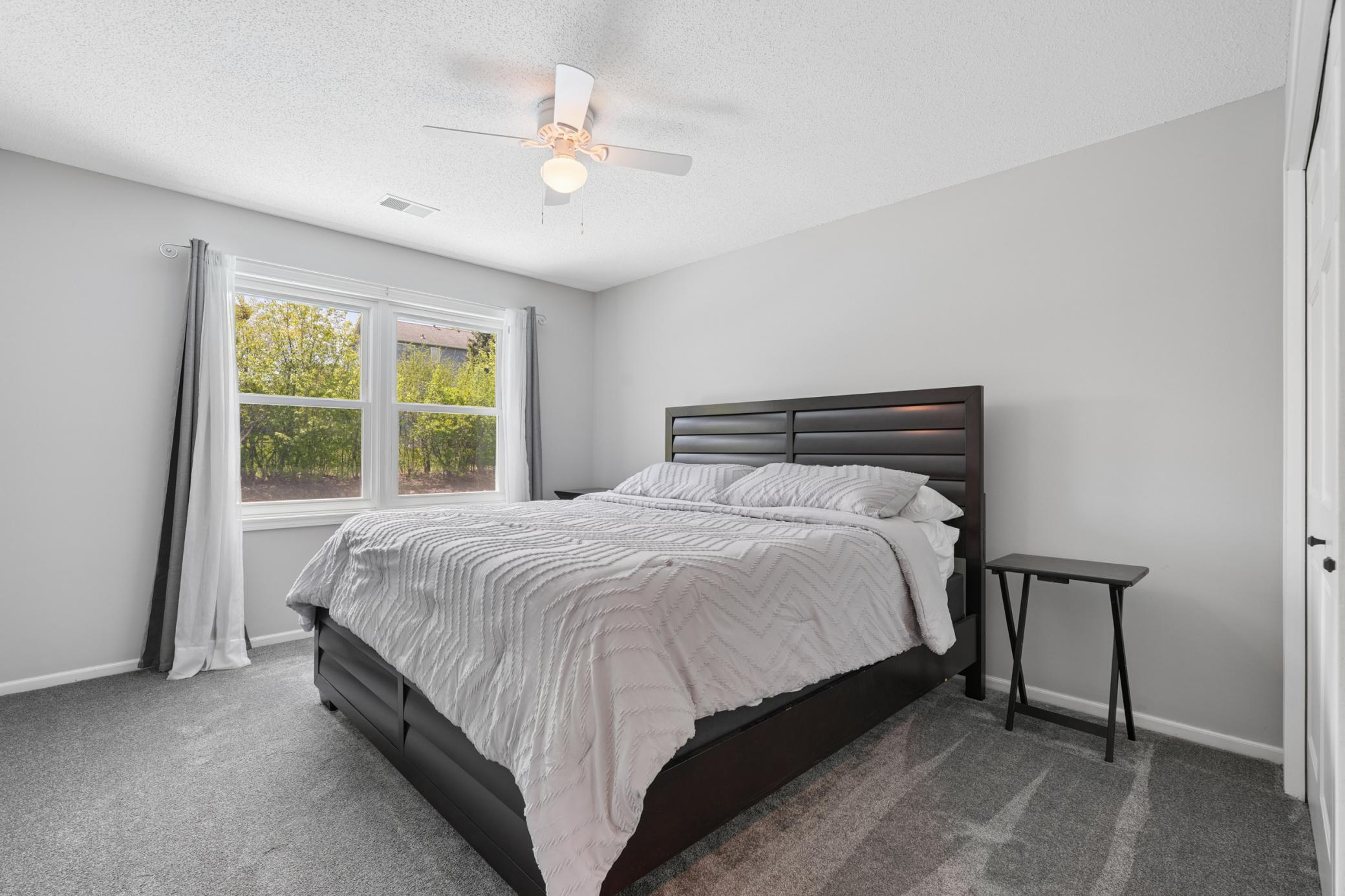 One of four upper level bedrooms.