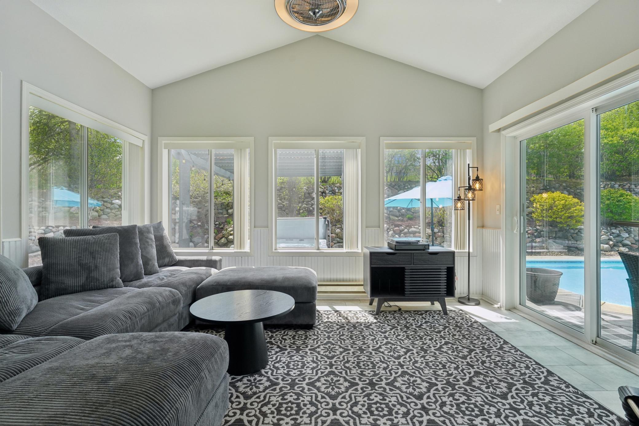 Fantastic, heated sun room that walks out to the pool deck!