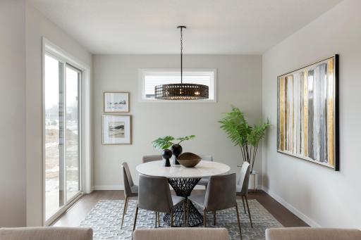 Dining space with so much natural light coming in.