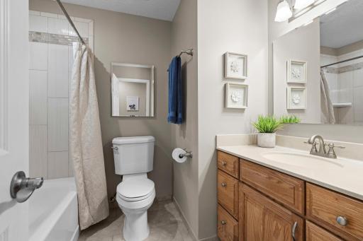 Two beautiful bathrooms! One on each level, full bathroom on the main! Check out the gorgeous tiled shower!