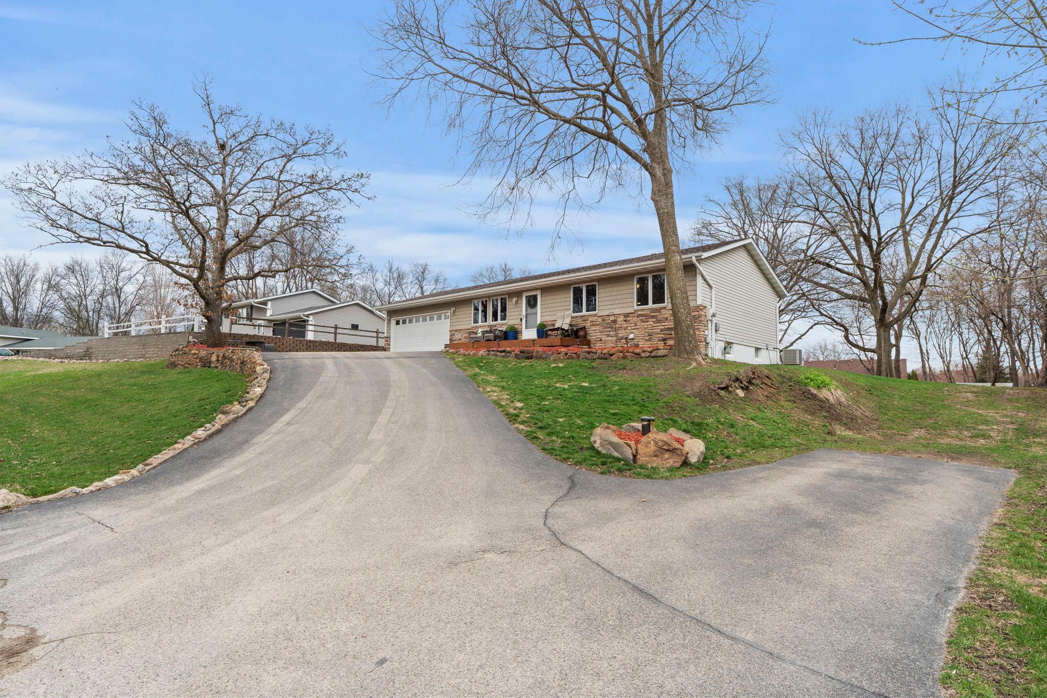 Incredible .59 acre lot. Standout curb appeal 10! Mix of beautiful stone, wood and vinyl siding. Extra parking / potential future additional driveway.