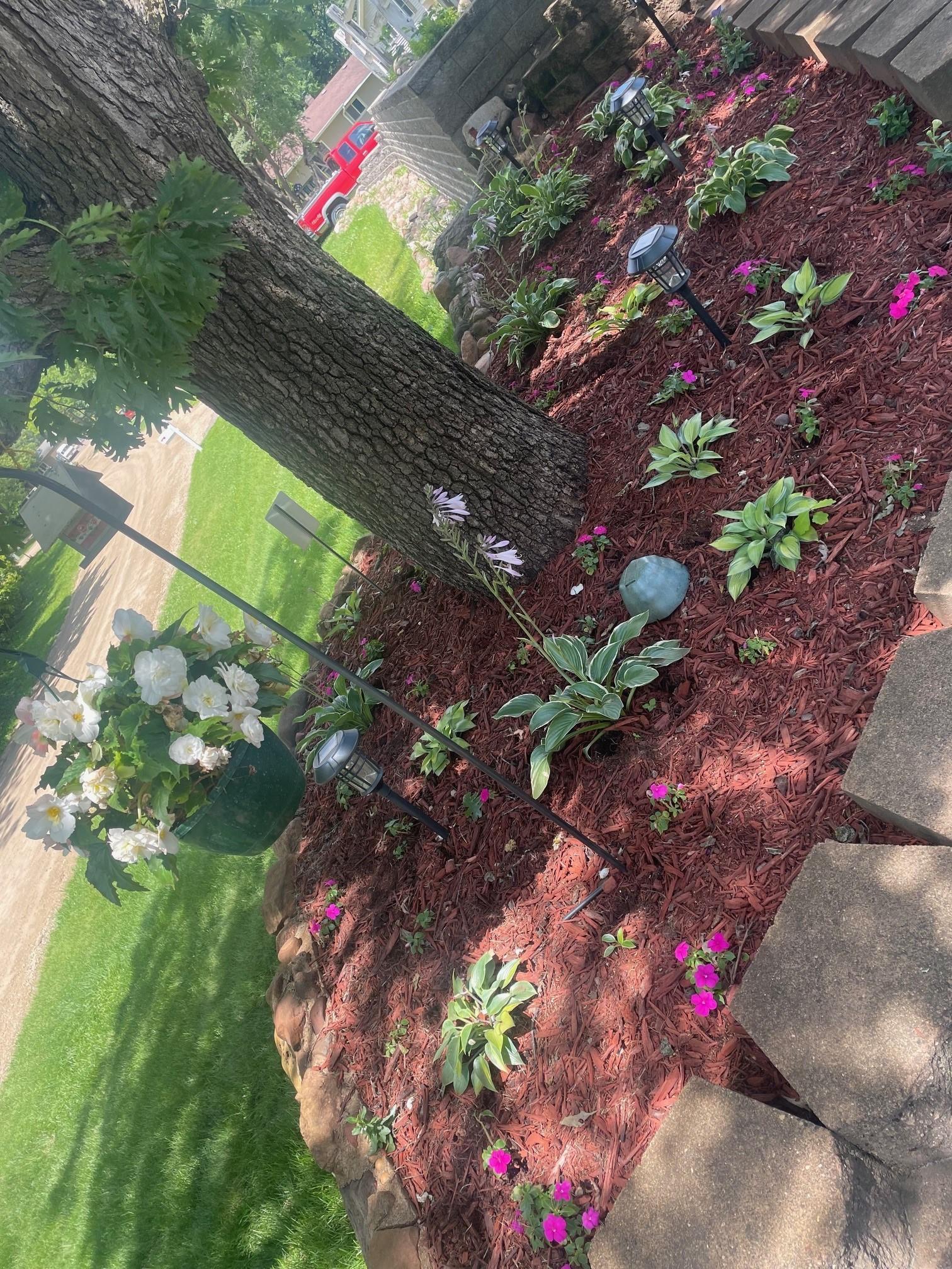 Thoughtfully landscaped with beautiful Perennials.