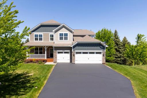 Nestled in the highly sought-after Highpoint at Riley Creek community in beautiful Eden Prairie, this exceptional home offers a rare blend of privacy, elegance, and timeless design.