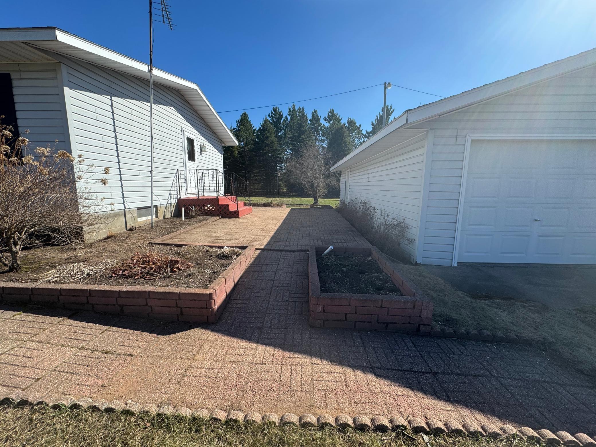 Patio between house and garage