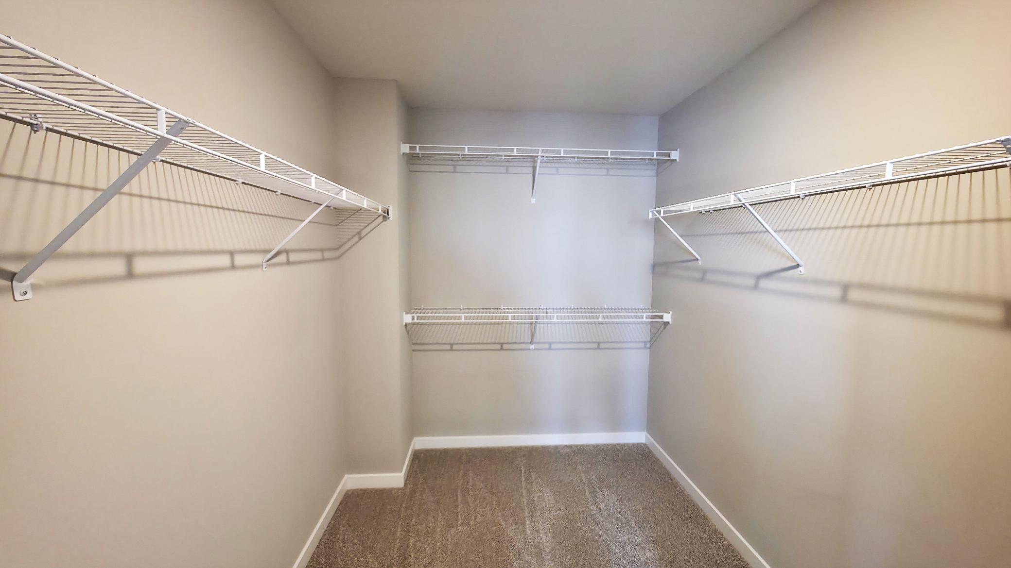 Model Representation 1 of 2 Primary Bedroom Closets