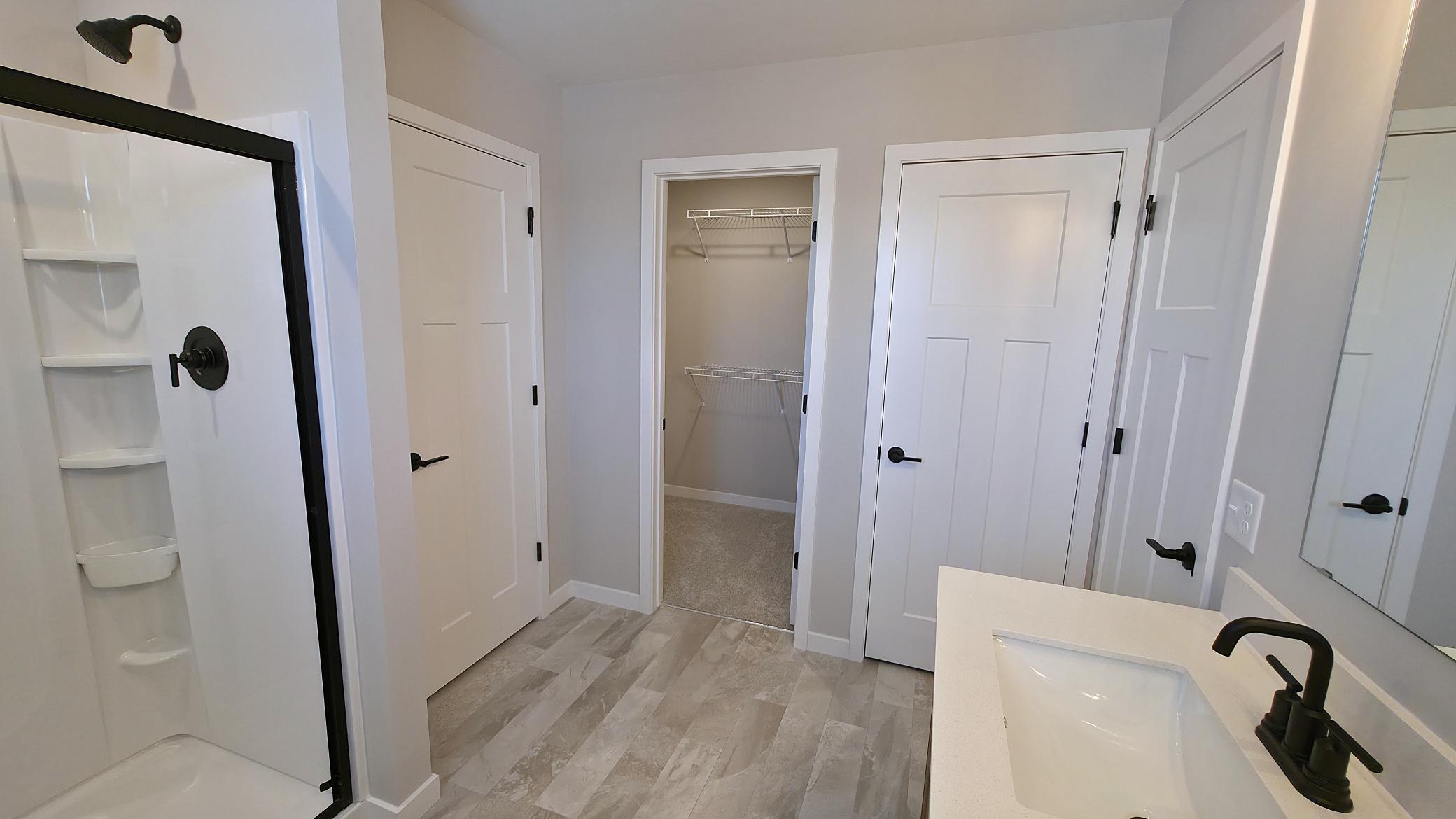 Model Representation 2 of 2 Primary Bedroom Closets