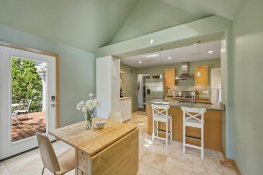 The open flow from kitchen to dining to deck makes this space as functional as it is beautiful â perfect for everyday living and easy entertaining.