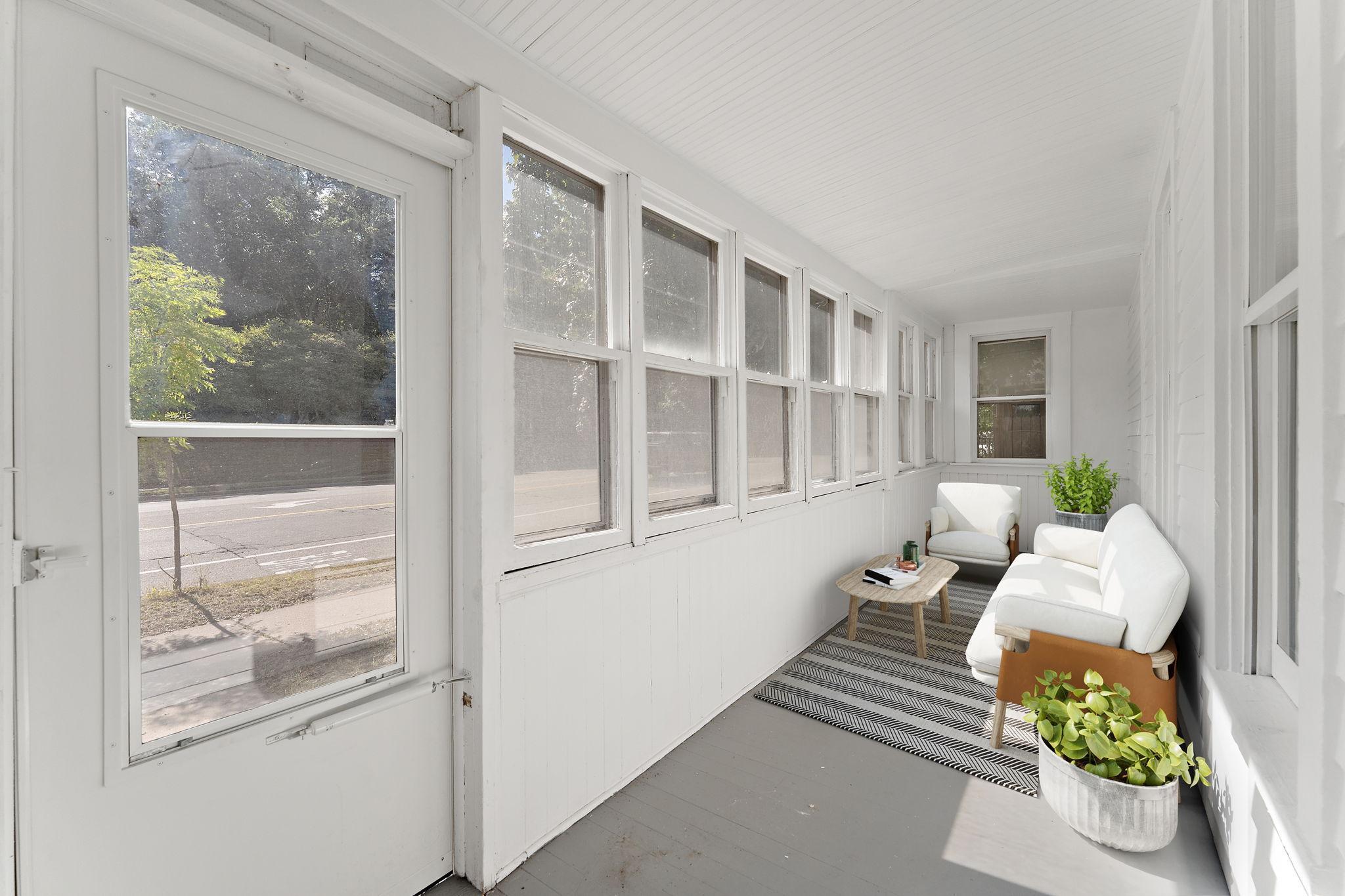 Expansive front porch! Sit and enjoy your morning coffee or some quite time to unwind at the end of your day with peaceful views