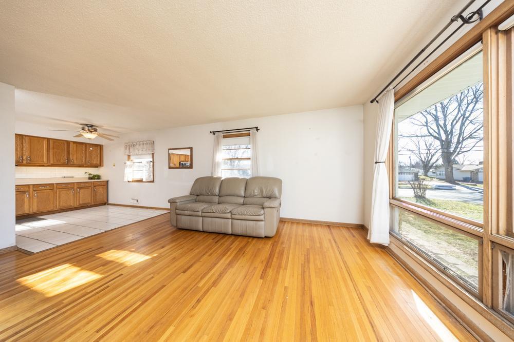 The living room flows seamlessly into the kitchen