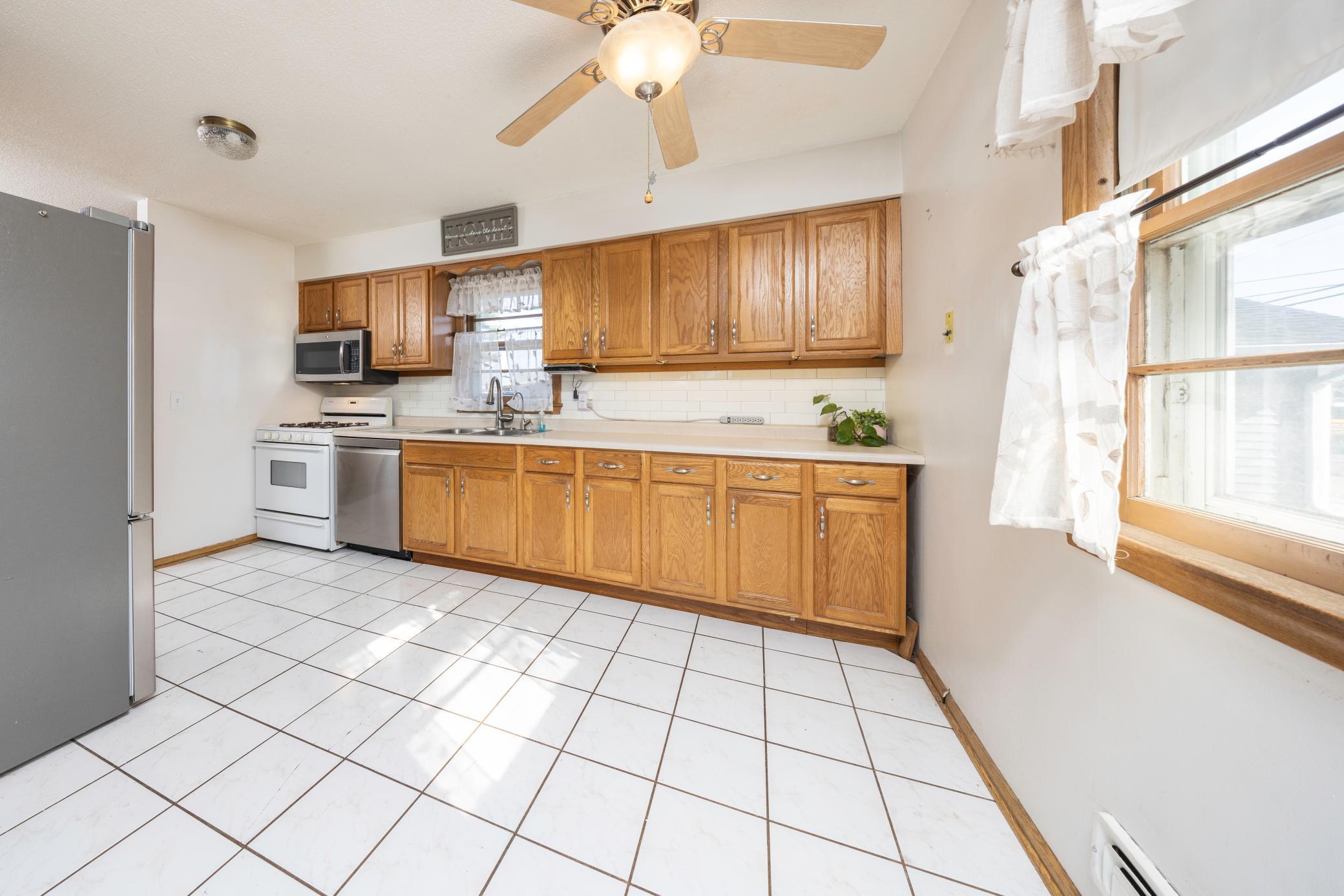 The spacious kitchen has plenty of cabinet and countertop space