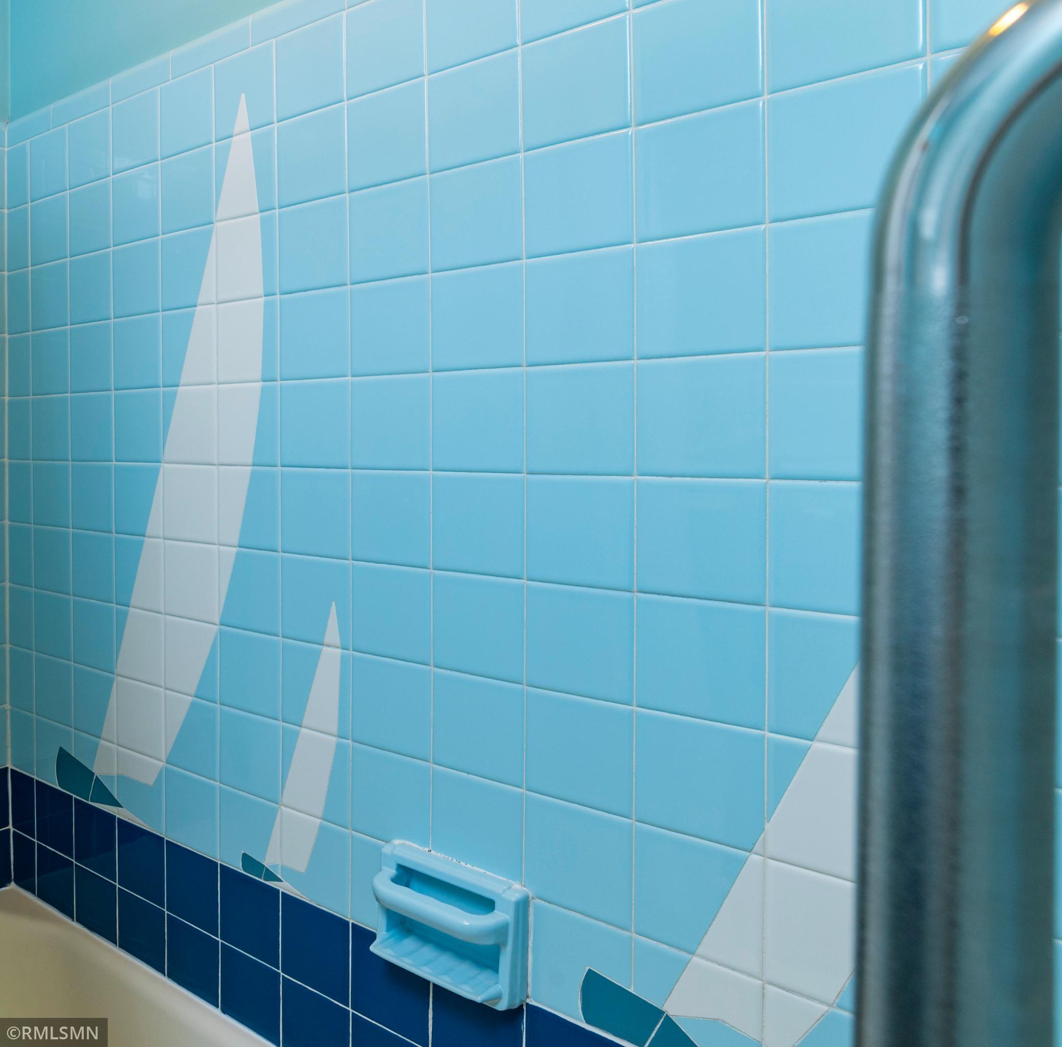 Ceramic sailboat motif in the upper level bathroom