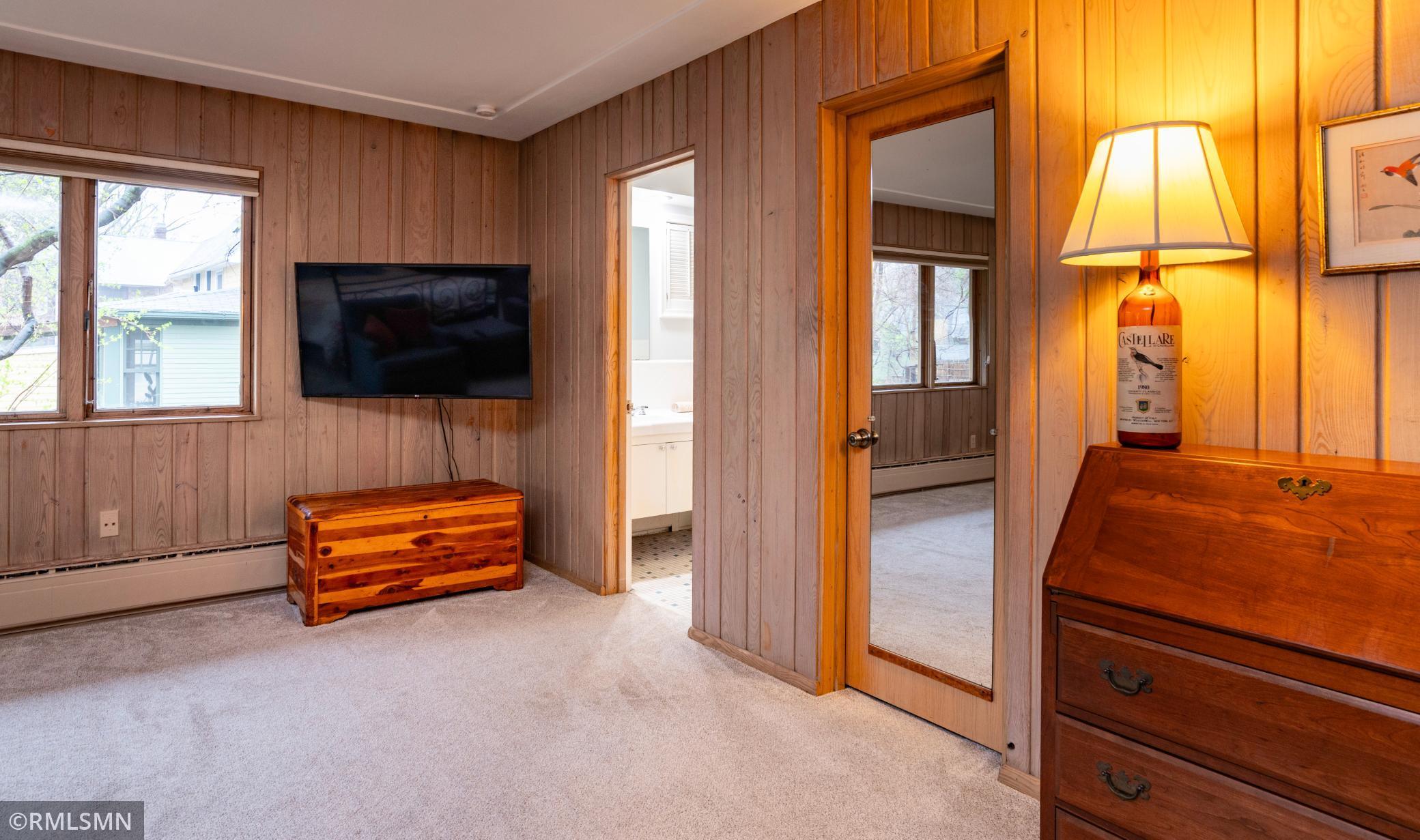 Adjacent doors to primary bedroom private bathroom and walk-in closet