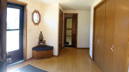 Easier is Better!!! Welcome friends in this large, ground-level foyer. Two closets are here & built-in seat to remove shoes, with extra storage. Your coats & jackets have a place here.