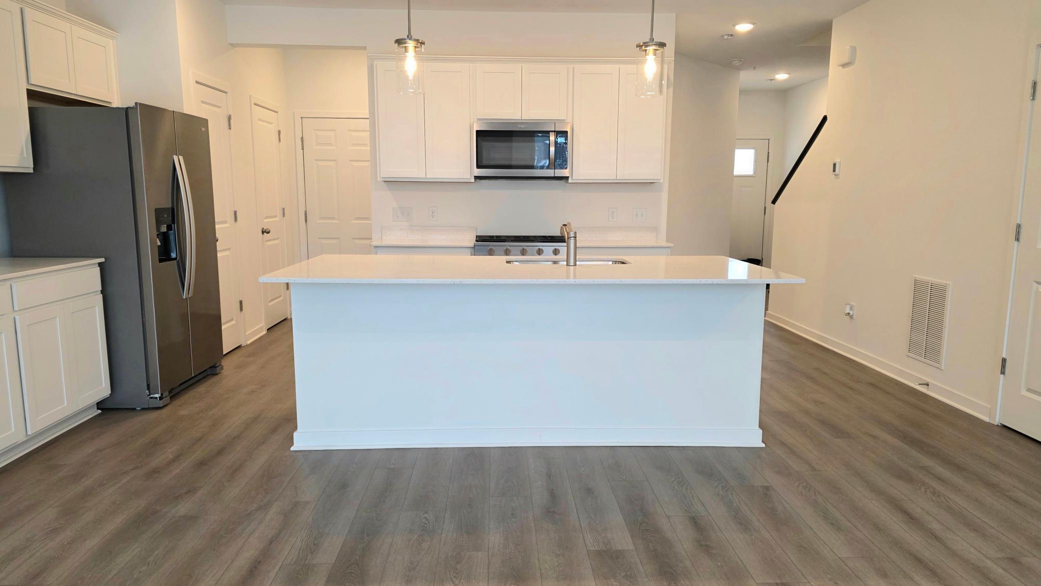 Photo of Similar Home (Actual Home Includes Open Rail with Decorative Balusters at Front Entry Stairs)