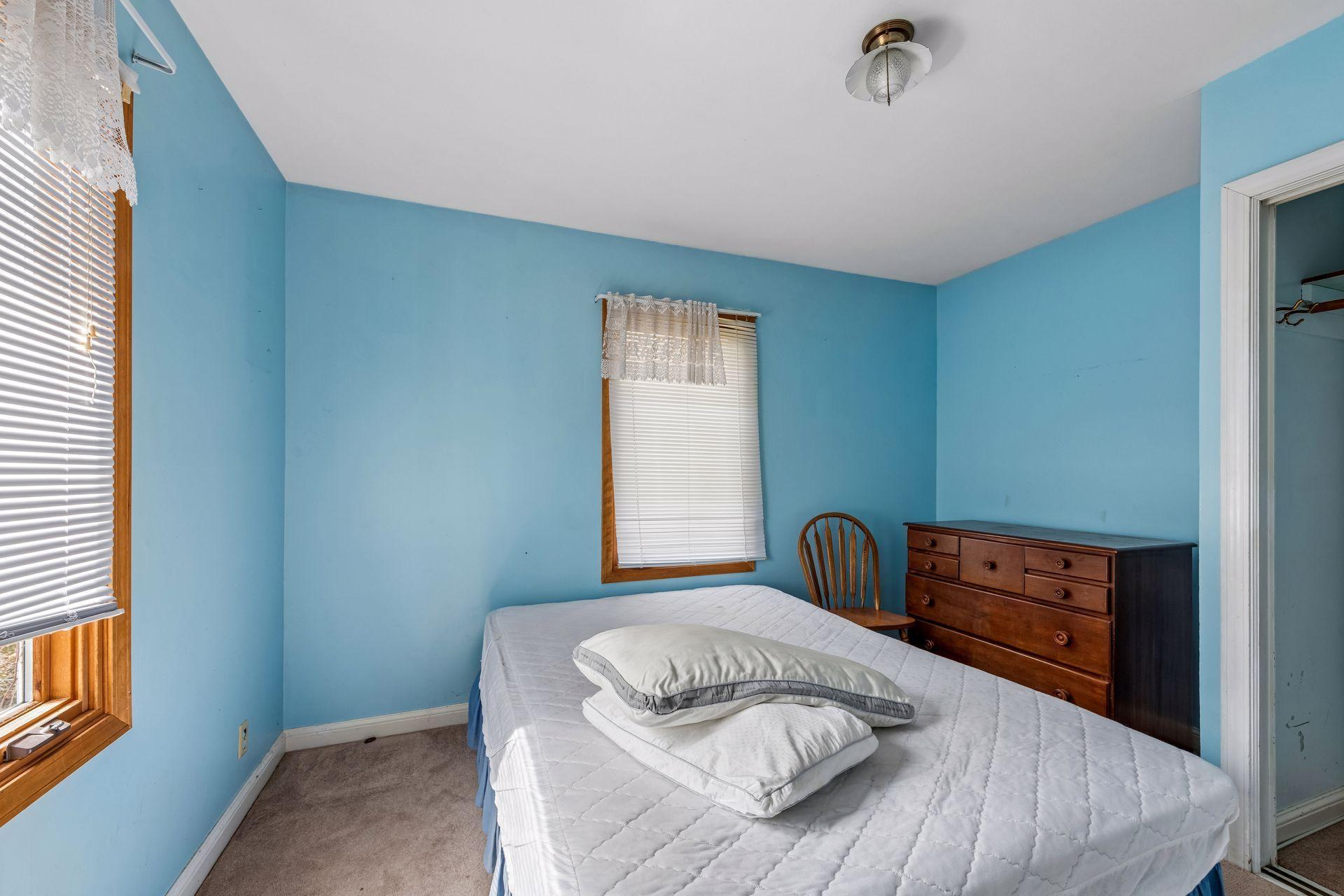 The second bedroom measures 12x10 and has a southwest exposure