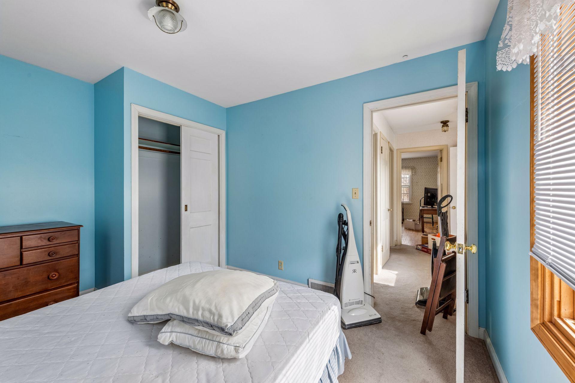 This room is bright and features white woodwork