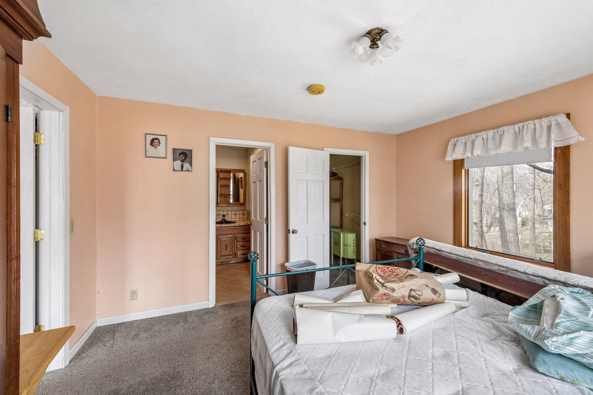 There is an ensuite bath and a large walk in closet