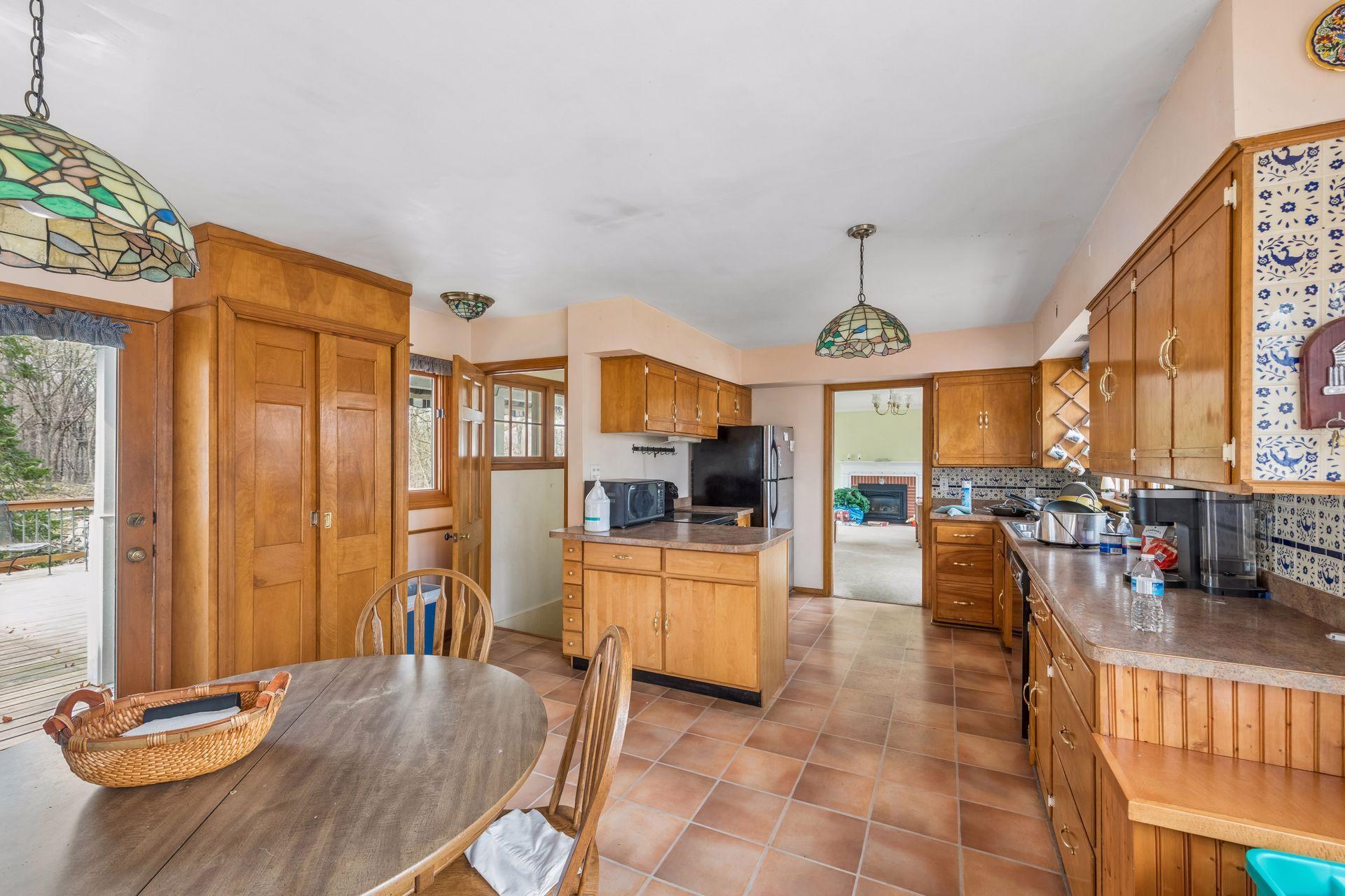 Tiled kitchen and informal dining area