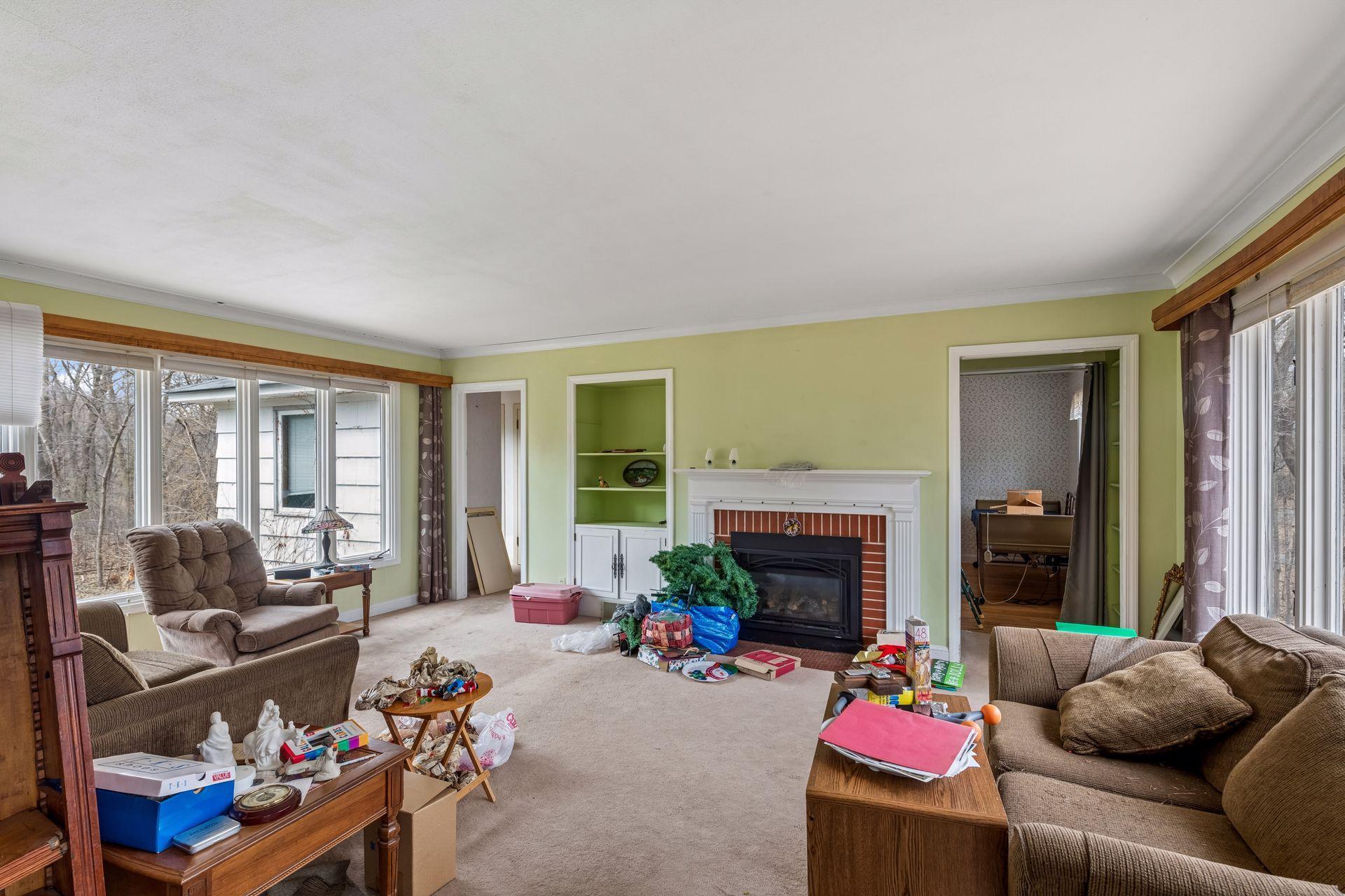 The living room has both east and west facing windows