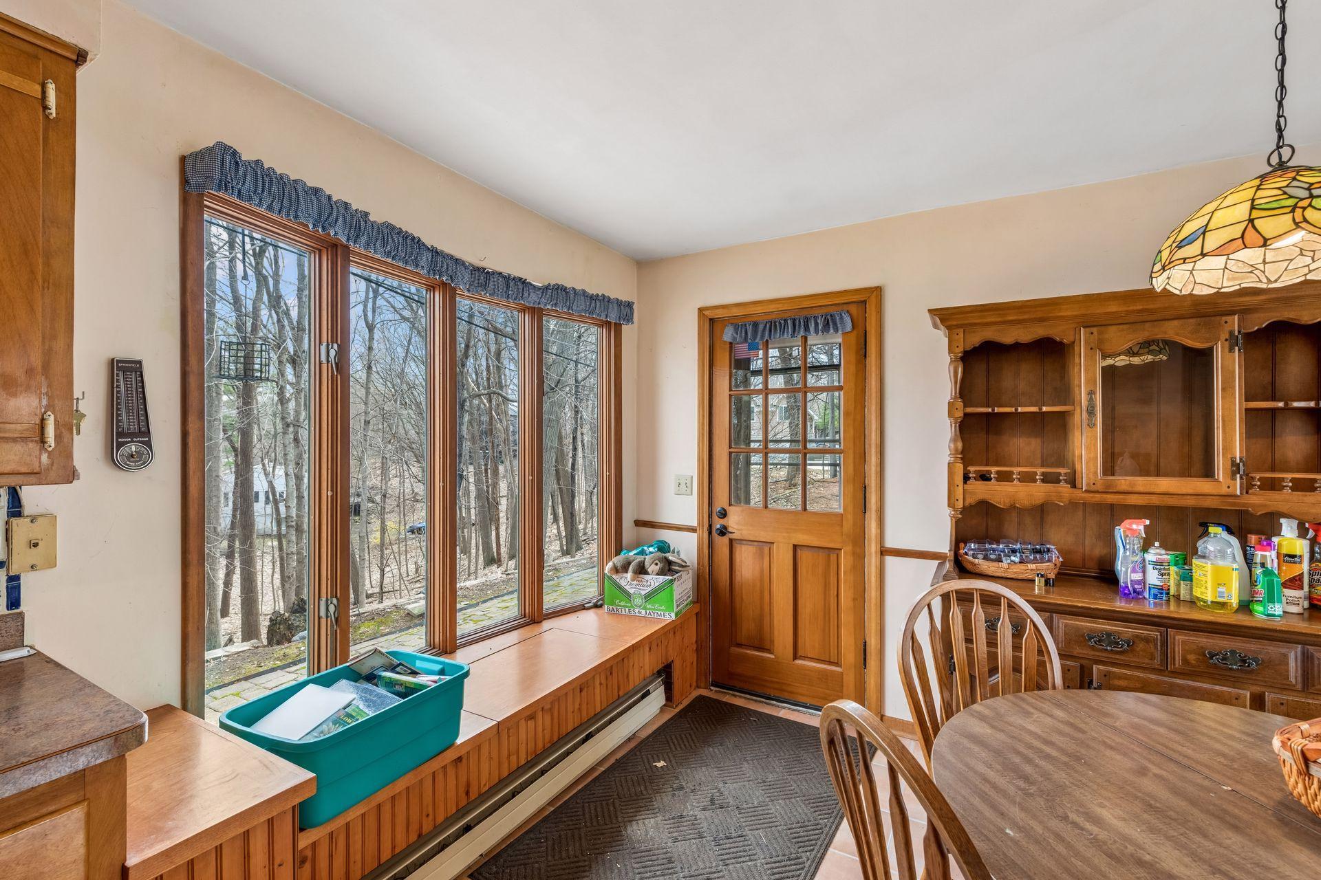 Side entry with bay window looking east