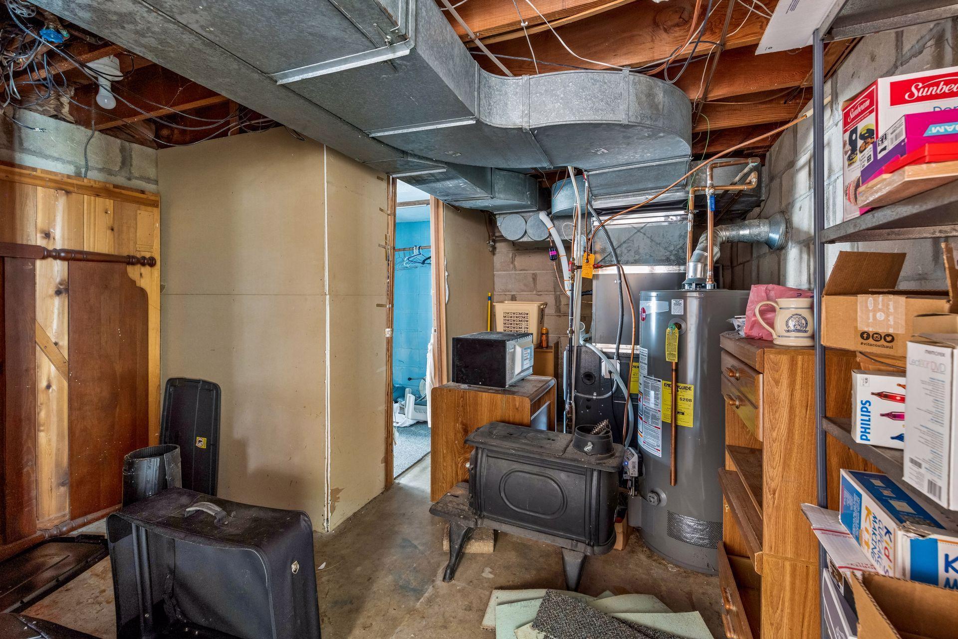 The utility room has a newer water heater in 2022 and furnace in 2018