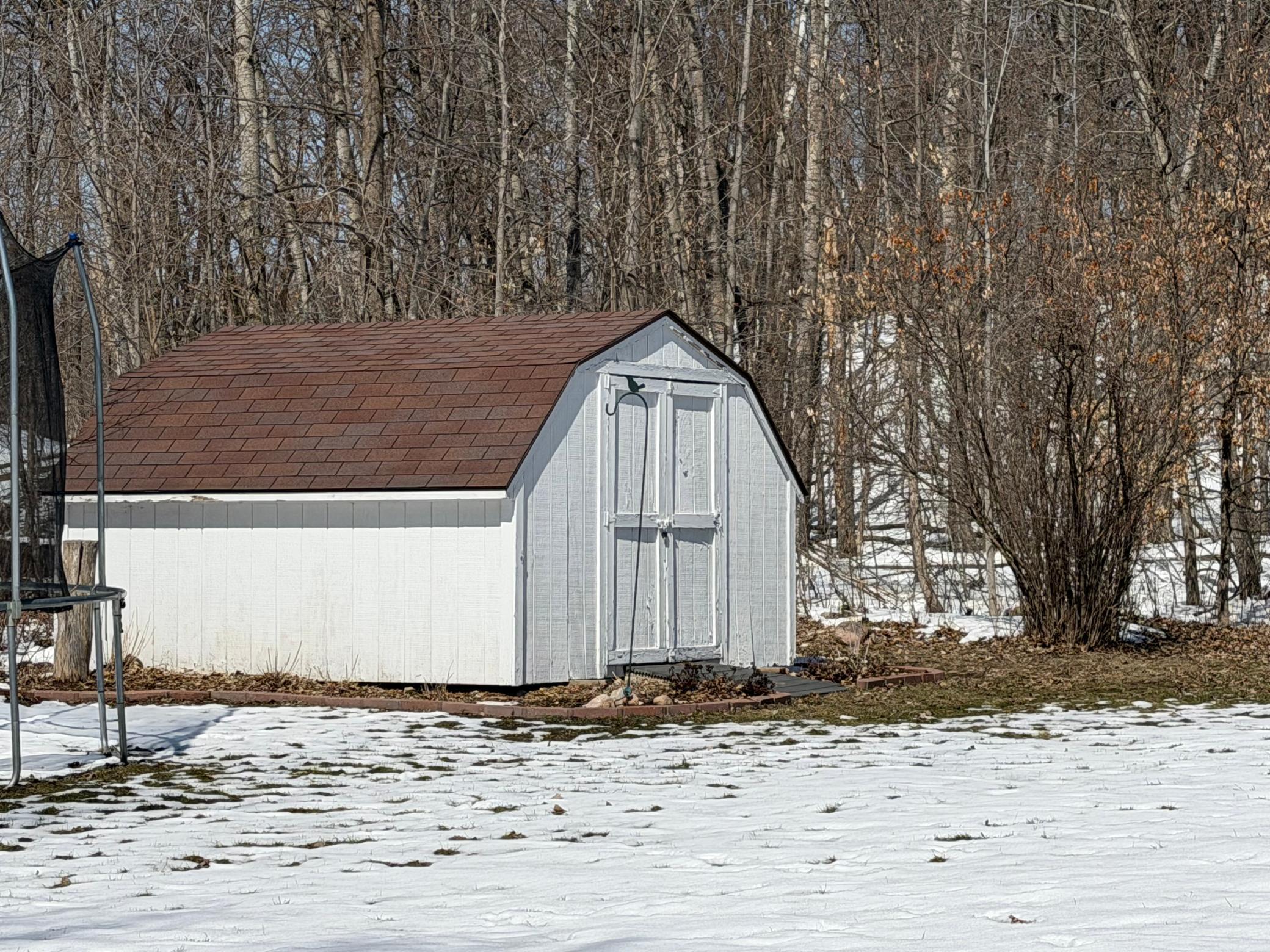 storage shed included, trampoline excluded