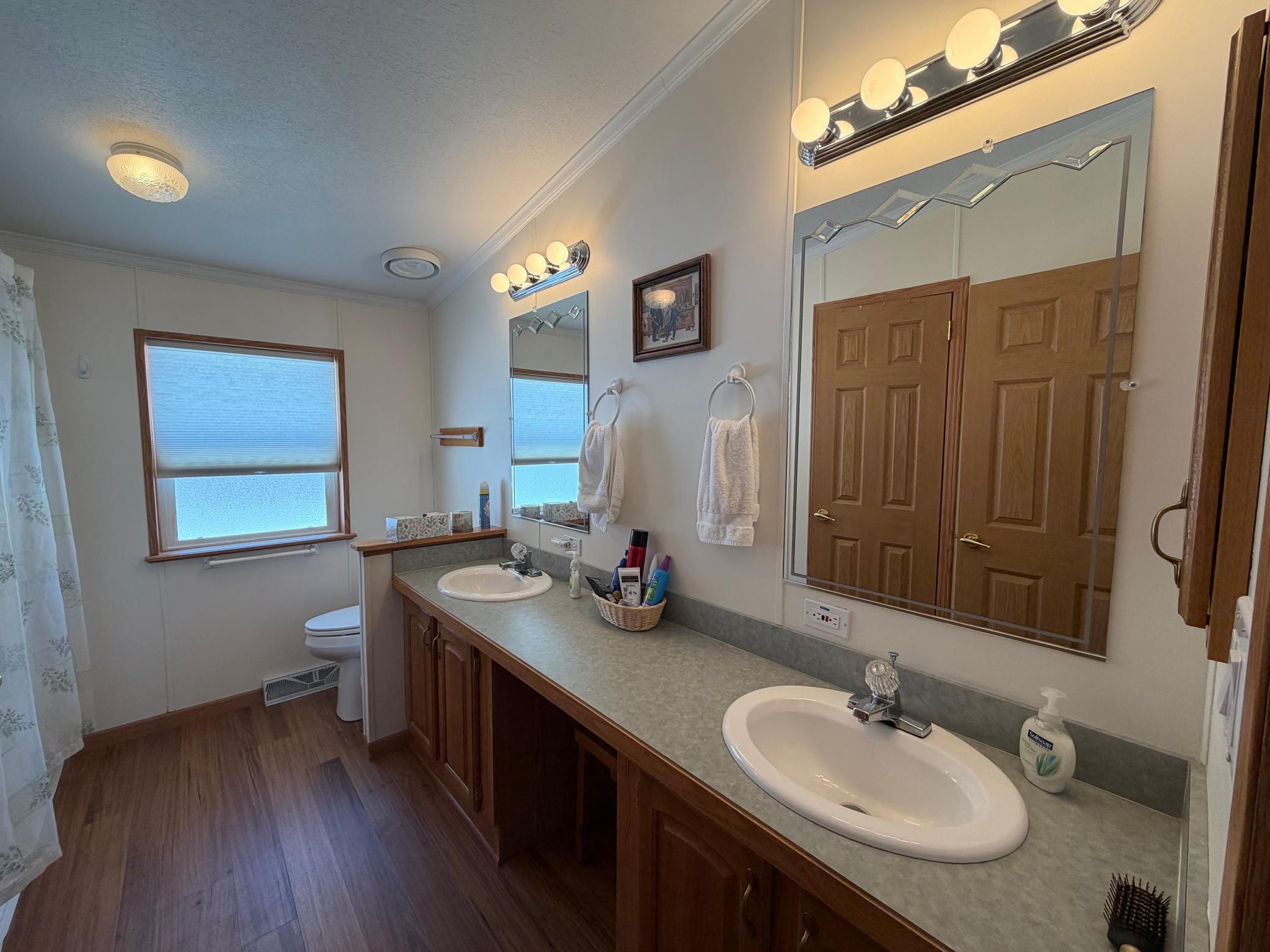 Full bath with double sinks