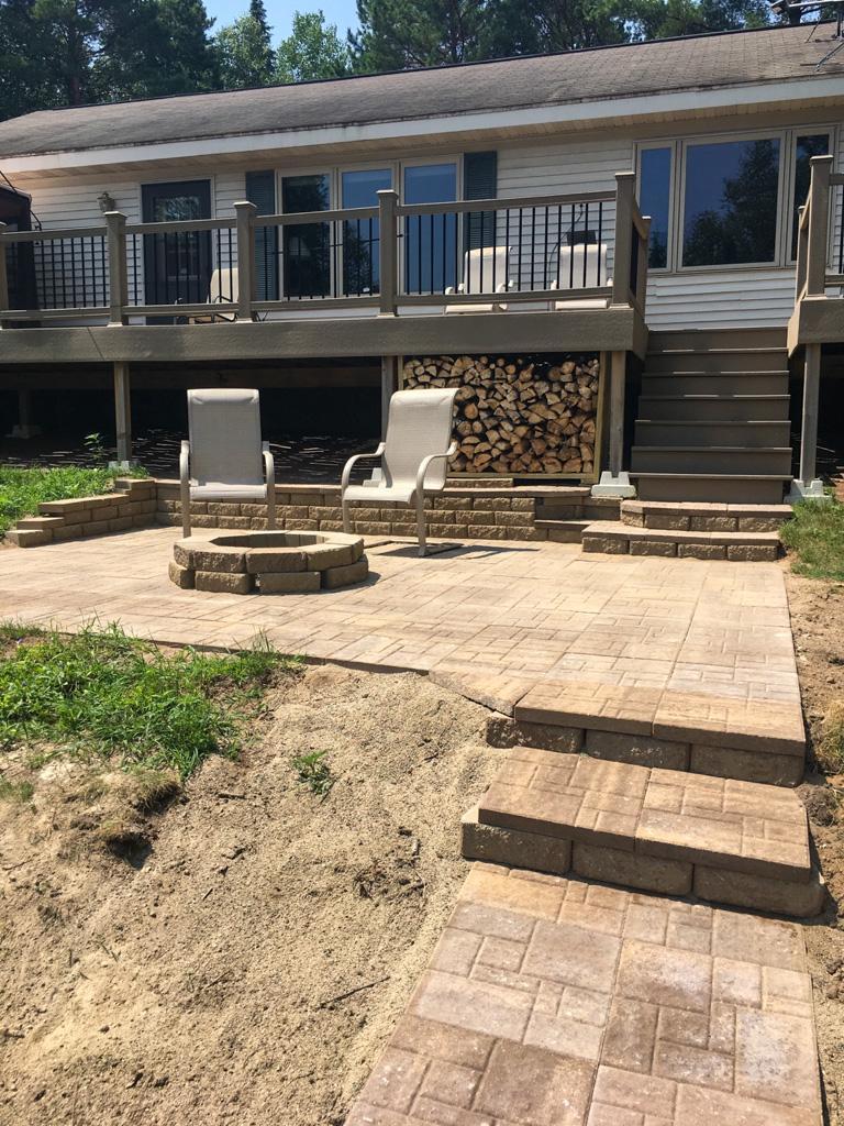 Patio and firepit. Photo taken prior to new roof in 2018.