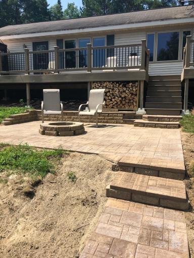 Patio and firepit. Photo taken prior to new roof in 2018.