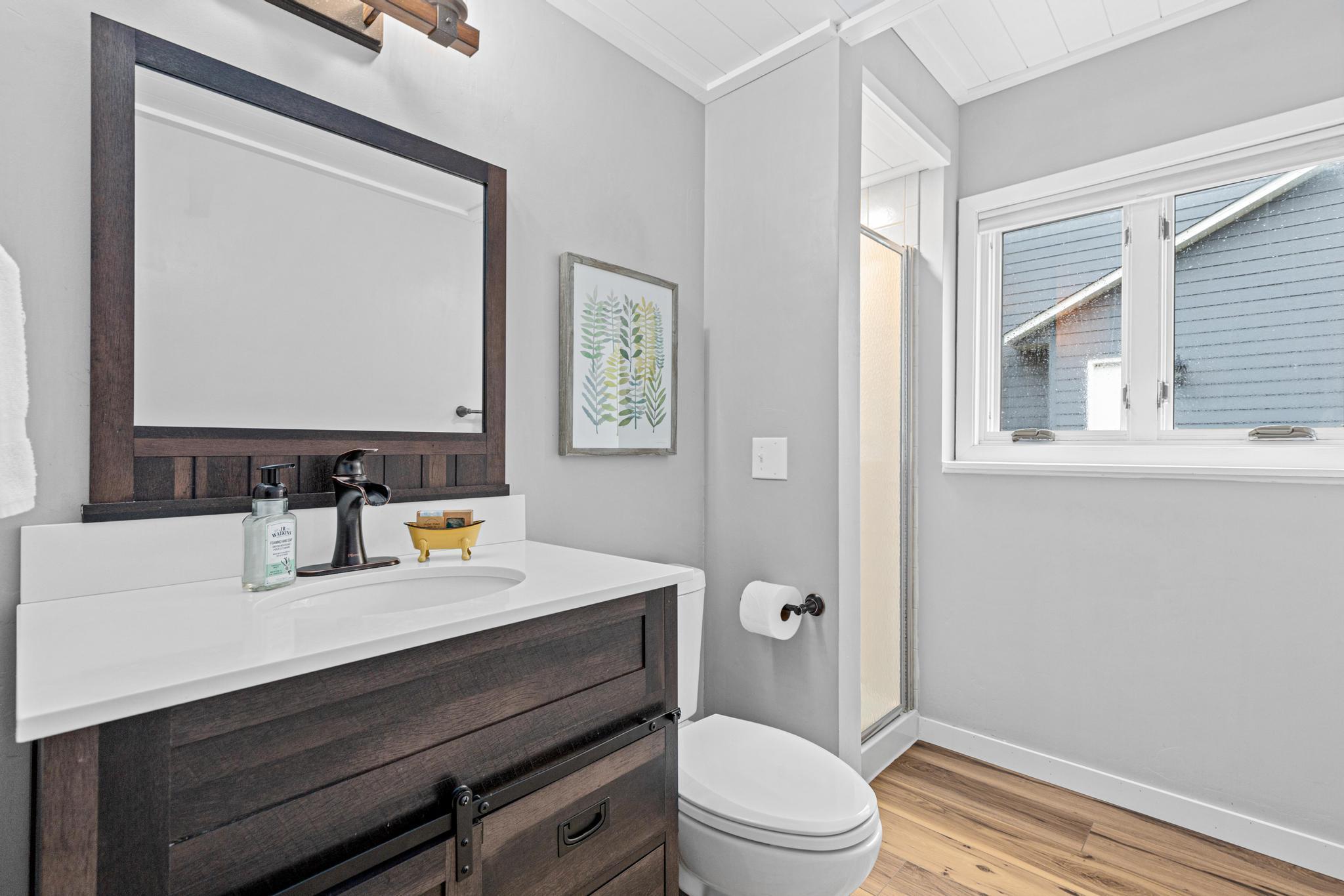 Updated lower level 3/4 bath with modern finishes