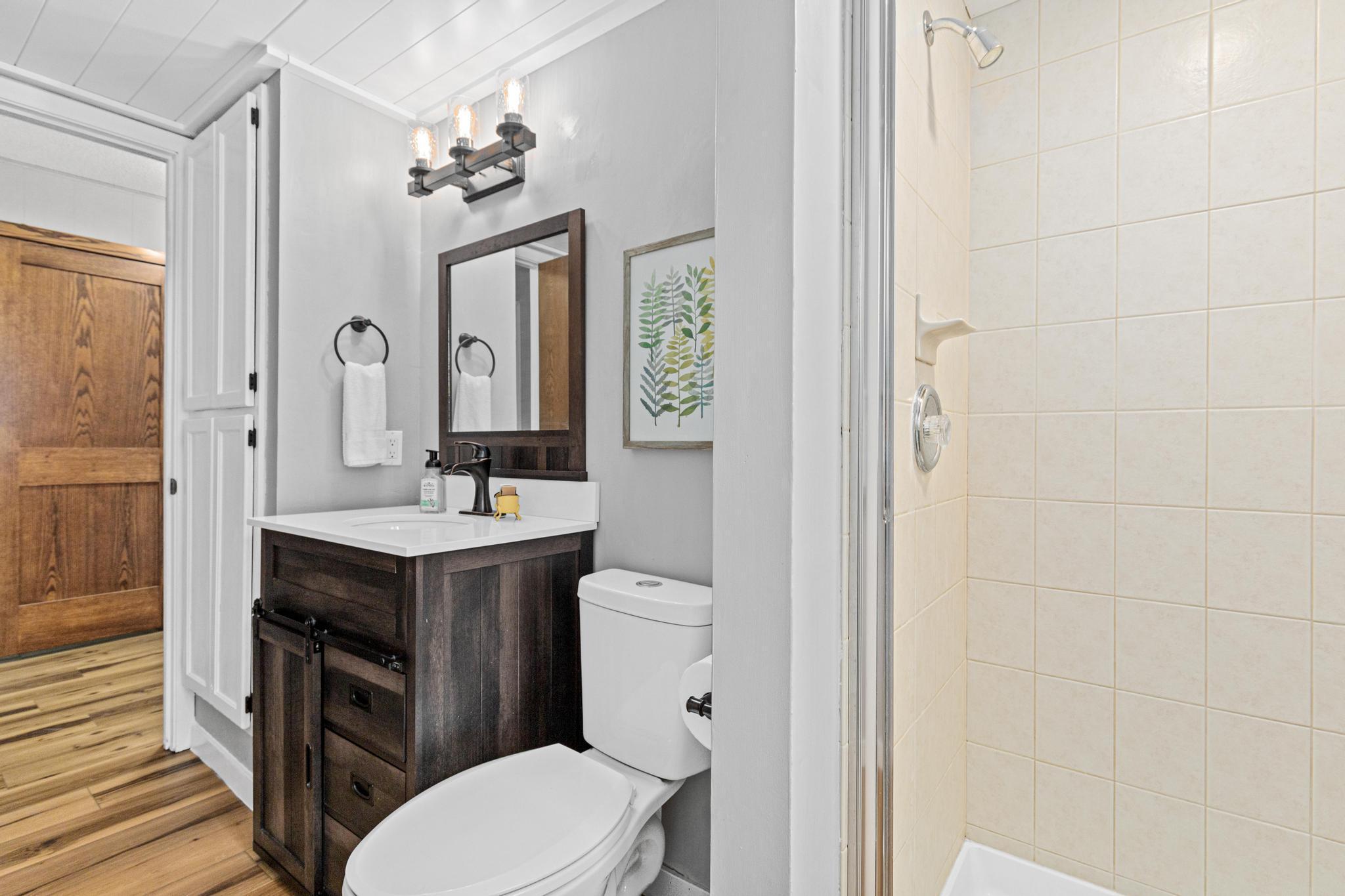 Stylish 3/4 bath with walk-in shower.