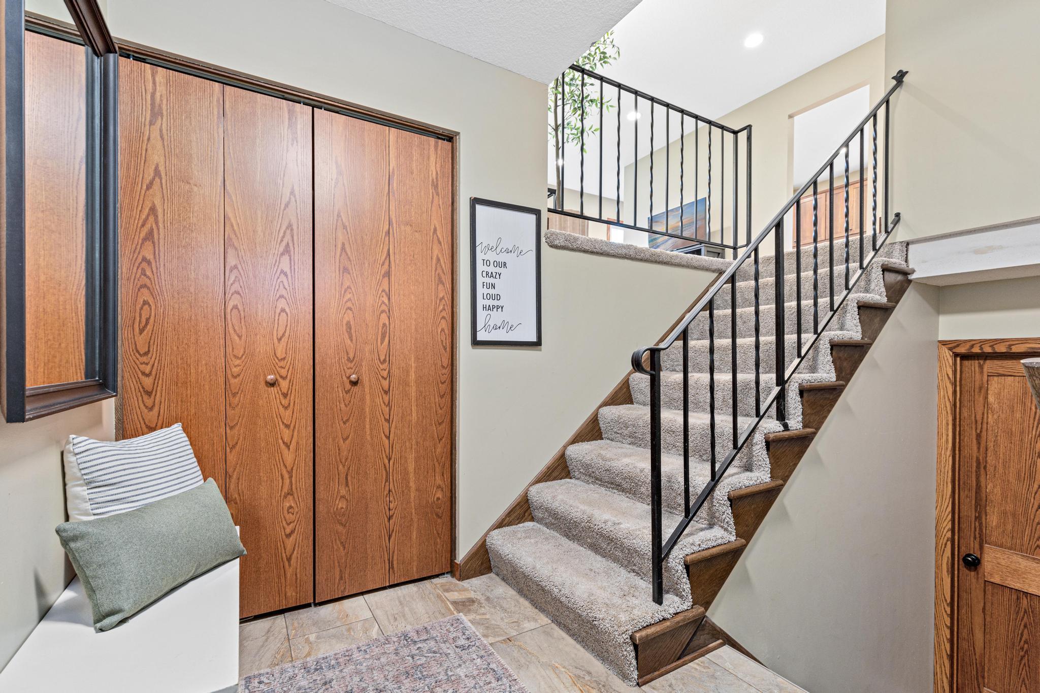 Smart entry layout with closet storage creates easy flow between levels.