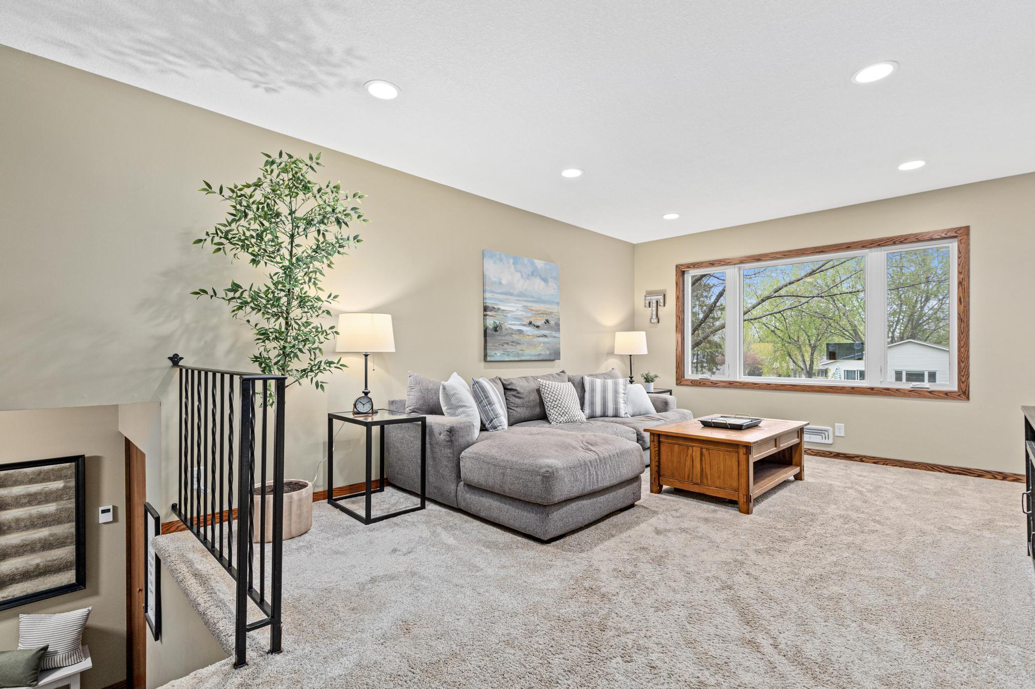 Light-filled upper level opens to the comfortable living spaces.