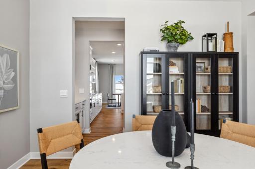Formal dining easily connects to the kitchen with 2 pantries..jpg