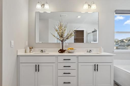 Primary bath with 2 sinks and Quartz couters..jpg