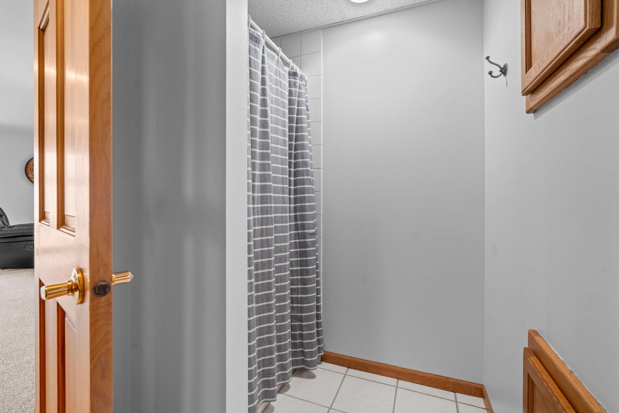 3/4 tiled bath off of family room & pool area!