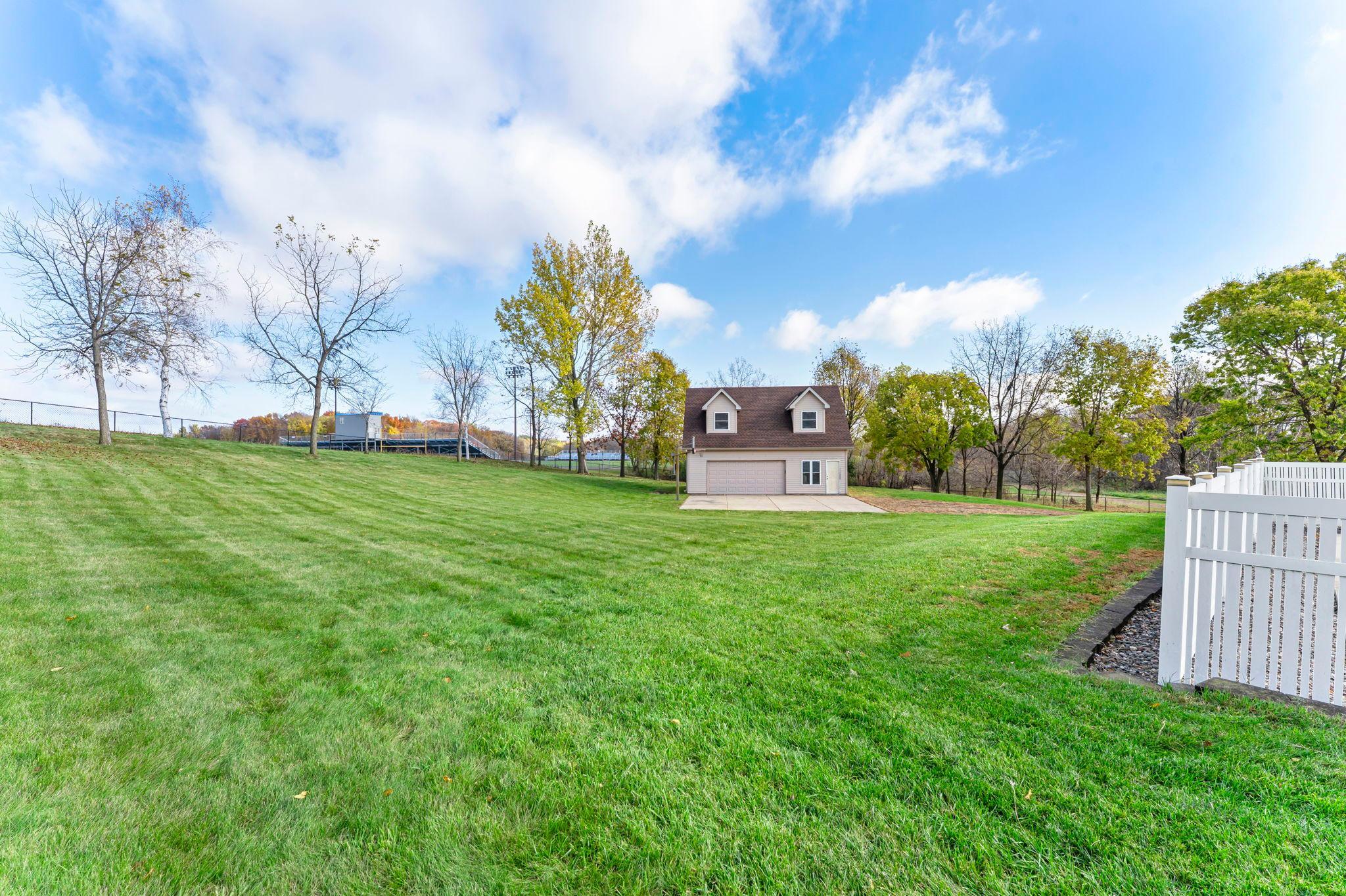 This charming out building with loft space, featuring 2 large garage stalls has so many possibilities! It can be a shop, pool house, kids hangout, she-shed, man cave, art studio, home office, etc.