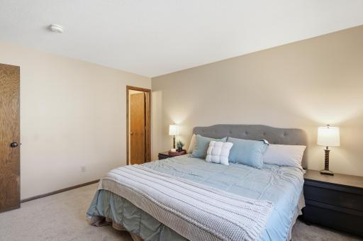 Comfortable primary bedroom with its own ensuite bathroom