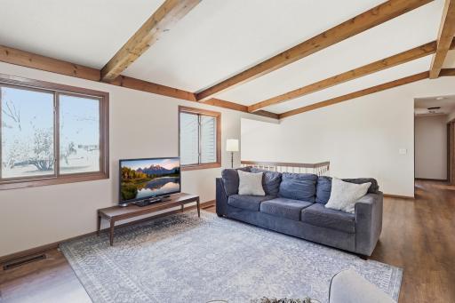 Wood ceiling beams bring in a touch of charm and texture