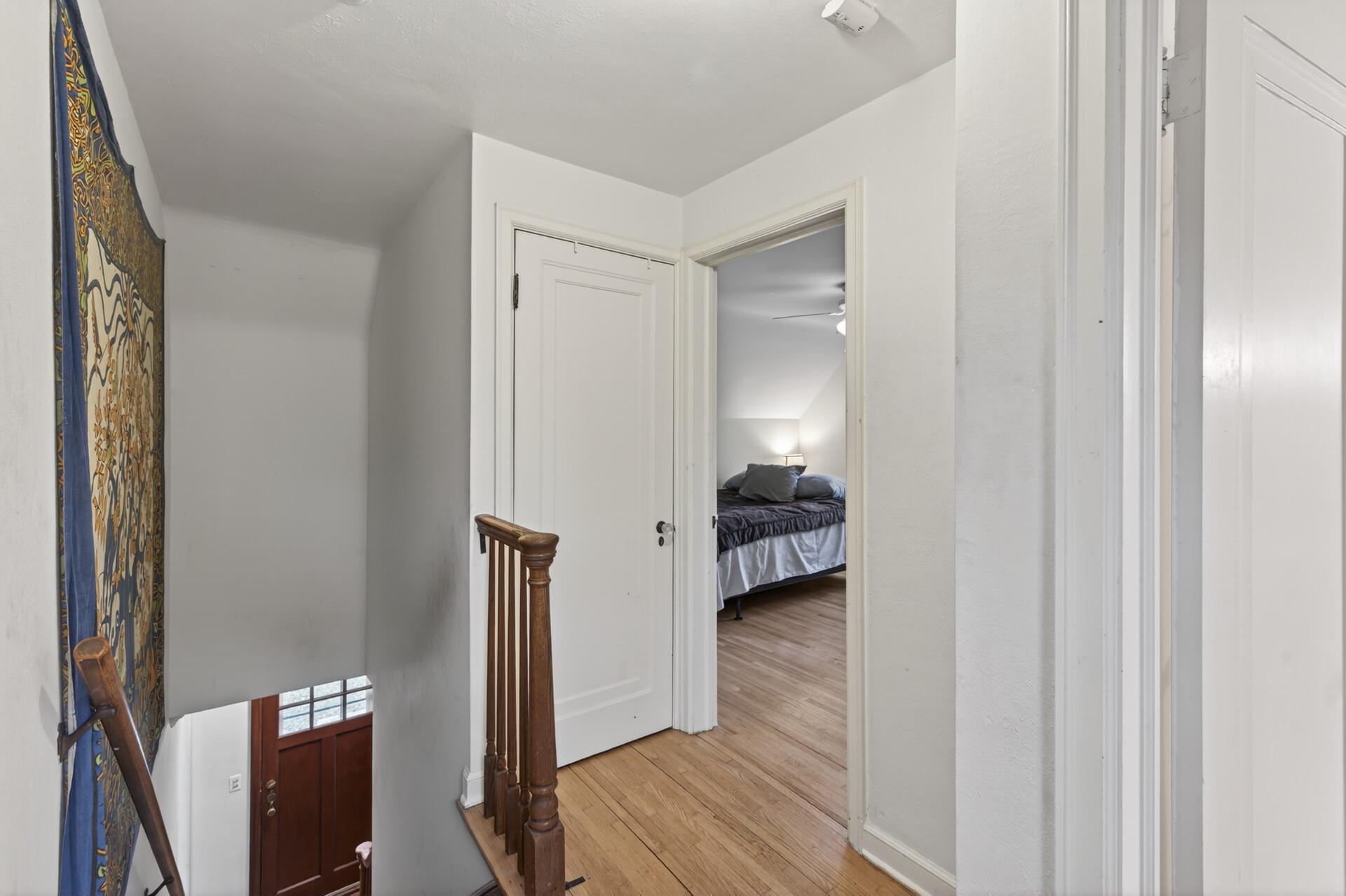 Landing upstairs connecting two bedrooms and a bathroom