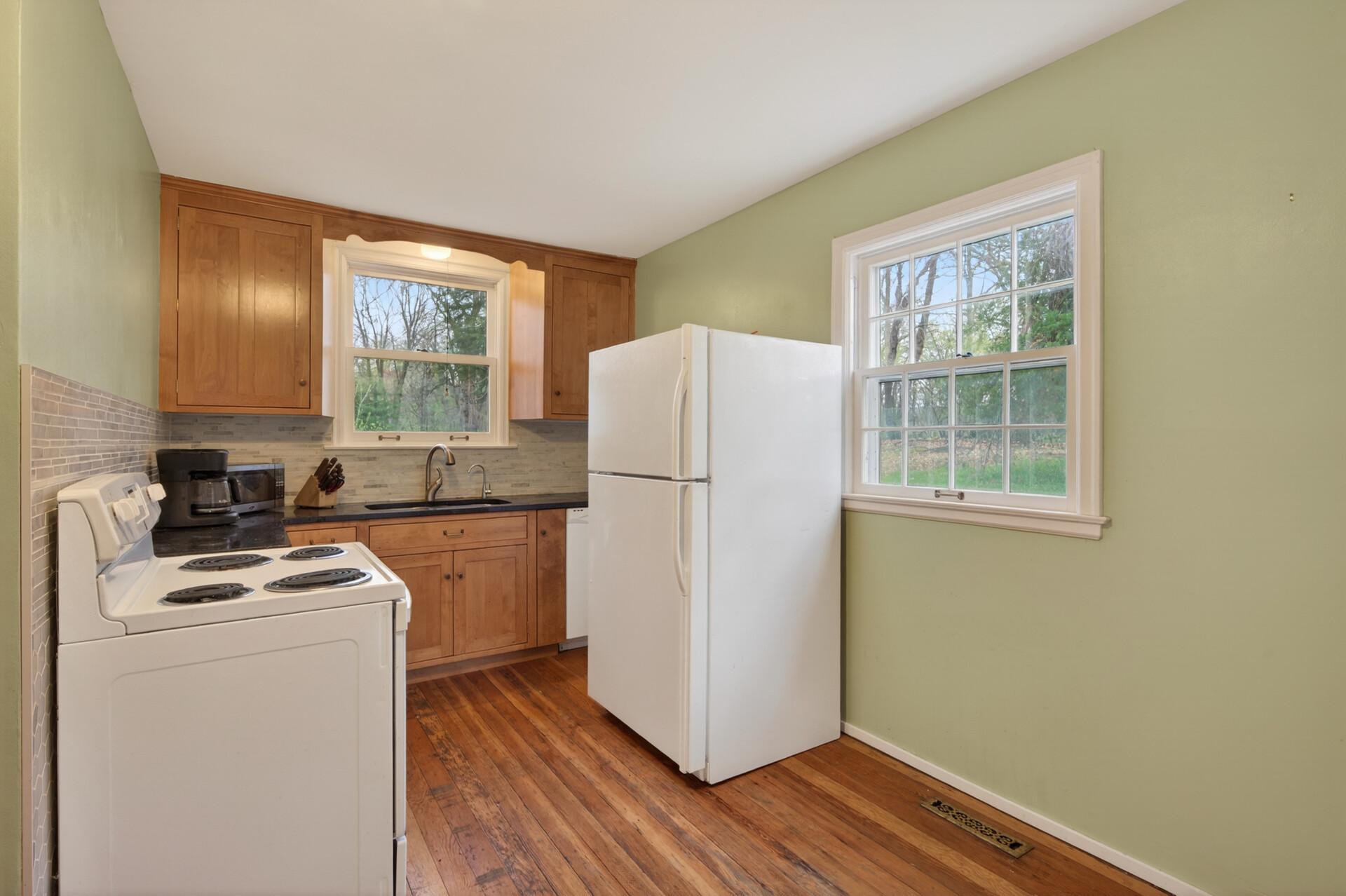 Kitchen off the back off the house looking over the backyard