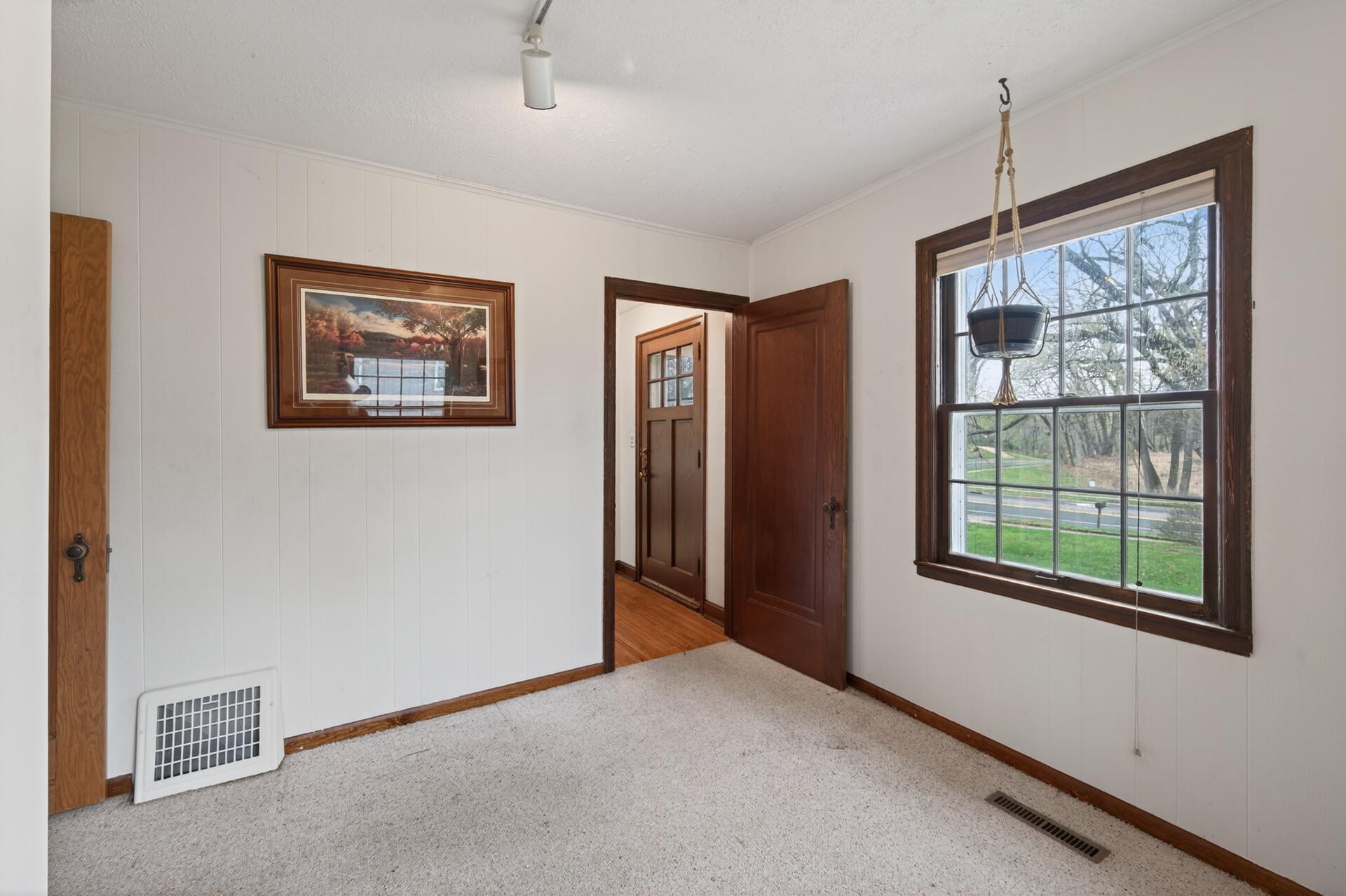 Main level bedroom that can be used as an office