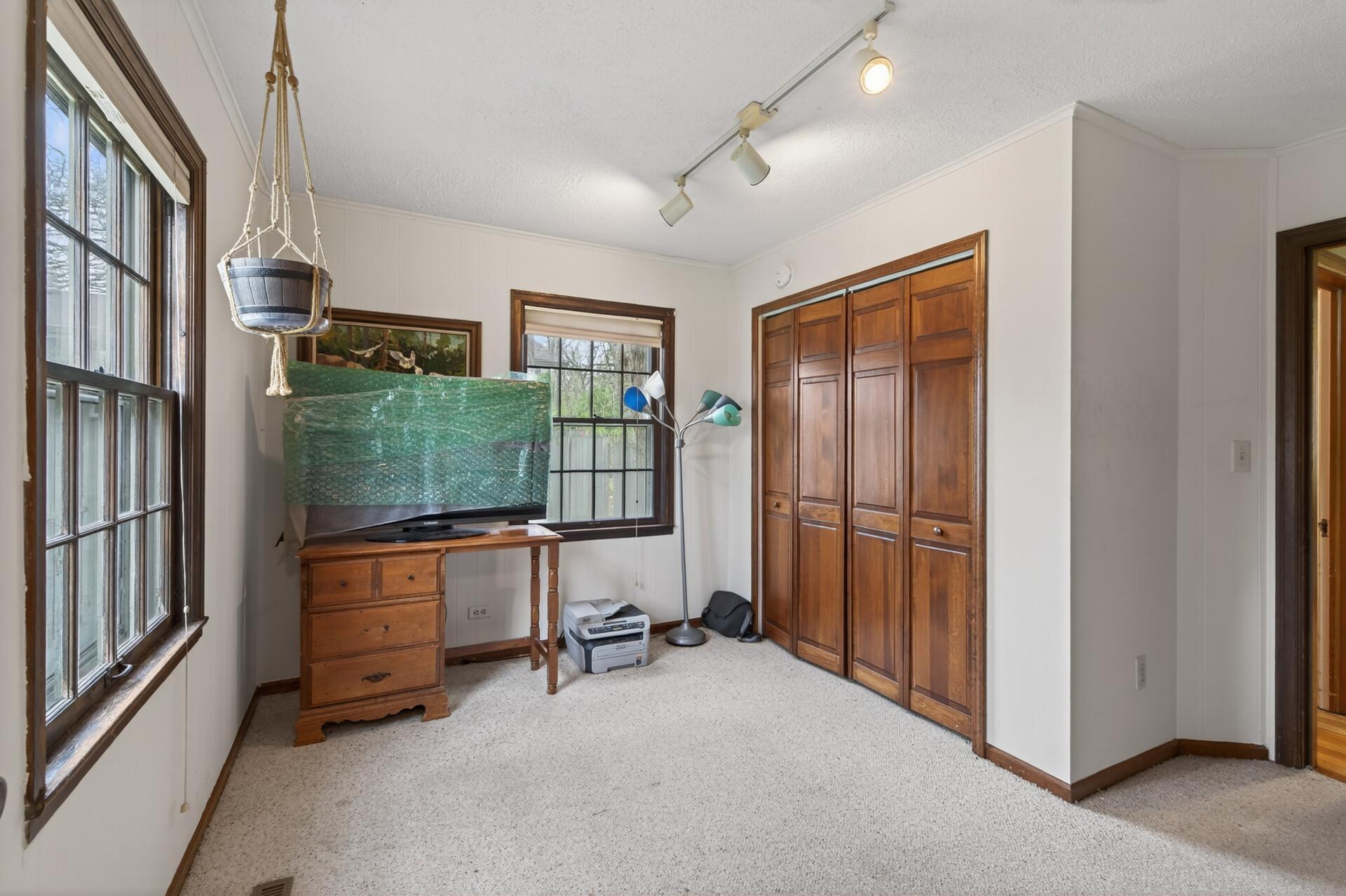 Main level bedroom that can be used as an office