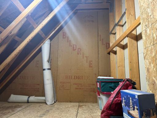 Garage attic storageâaccessed through pulldown ladder