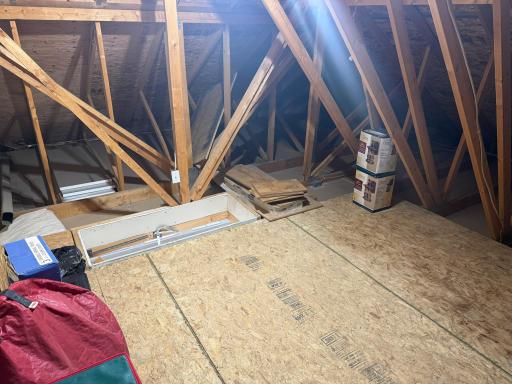 Garage attic storageâaccessed through pulldown ladder