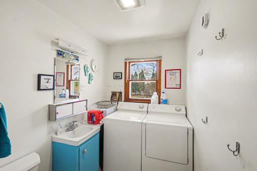 Main level laundry. Full sized. with second bathroom. All toilets are newer. Great closets, too!