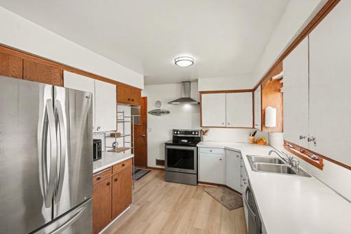 Kitchen is big! A ton of cabinet space. Solid wood. New floors, newer stainless steel appliances, and a whole lot of extras!