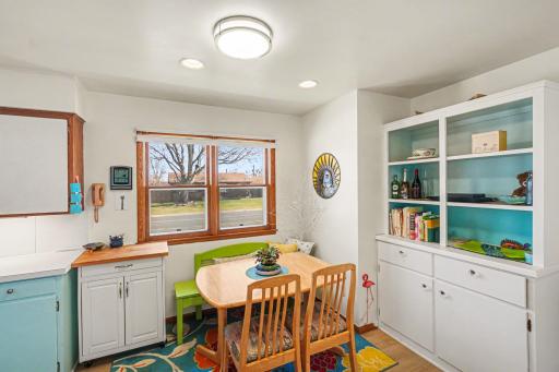 Beautiful built-ins and eat in kitchen/dining area. Front facing kitchen windows. New recessed lighting professionally added.