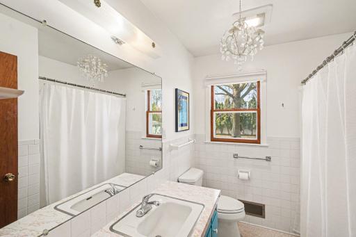 Main bathroom is a vintage charmer. You are going to LOVE the counter. Come see!