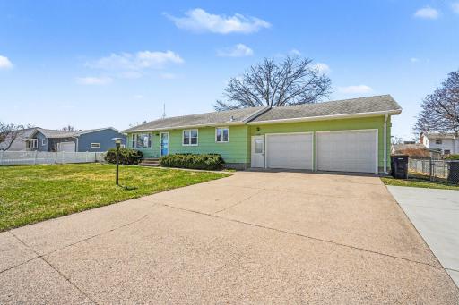 Front yard is tidy! Home has well done gutters, a new storm door, and a fully fenced back yard. Great neighborhood!